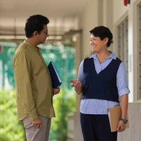 Two teachers engaged in a conversation