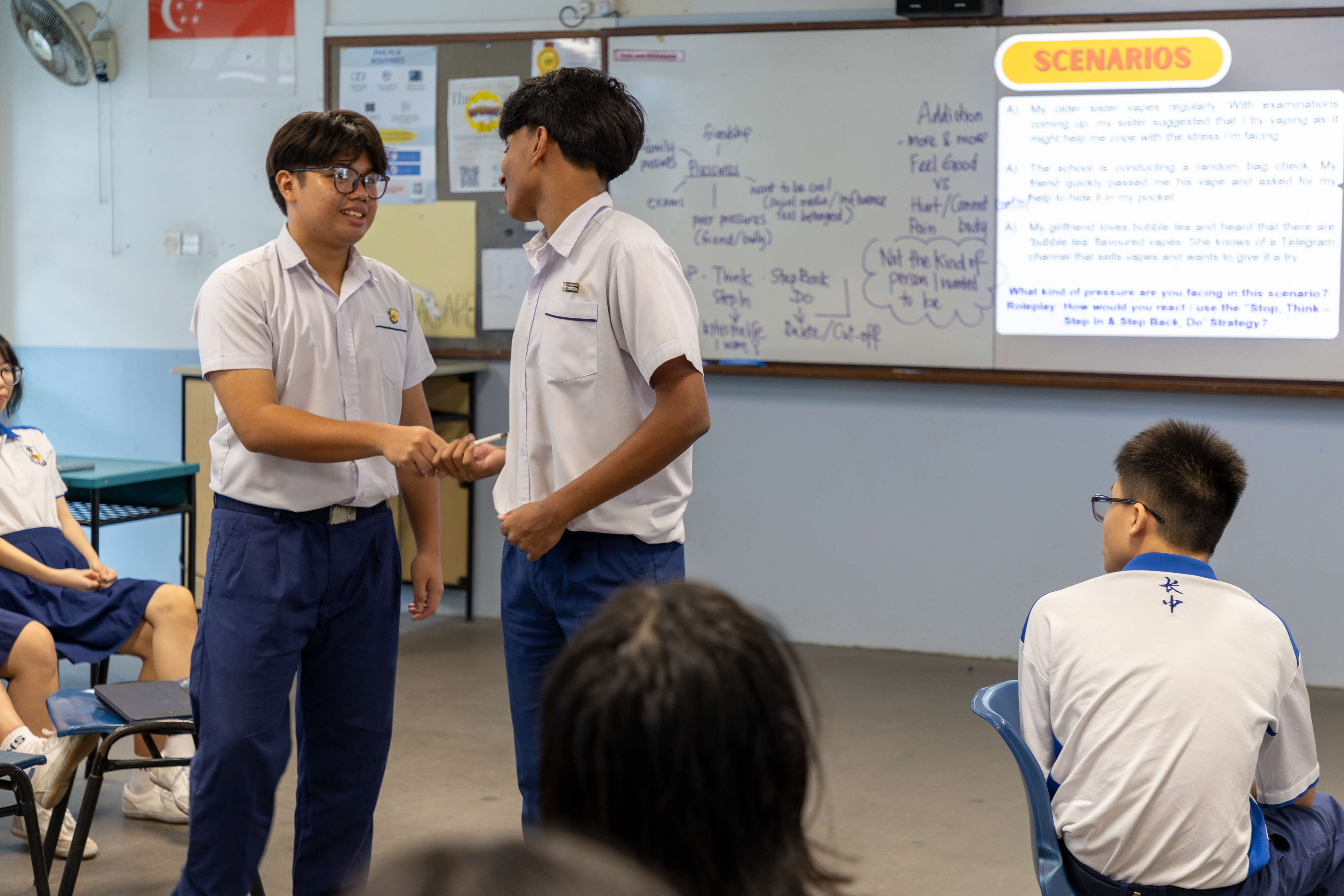 Students learning through role play in CCE lessons.