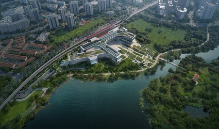 Aerial view of the new Science Centre surrounded by greenery and a lake