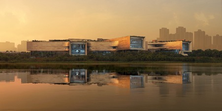 Waterfront view of the new Science Centre with building reflected in the water.