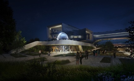 Night view of the new Science centre obsevatory with illuminated entrance and stargazing dome.