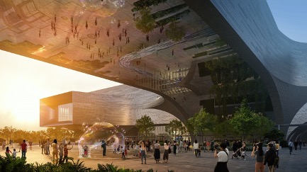 Outdoor activity plaza of the new Science Centre with crowd and overhanging architechtural structure.