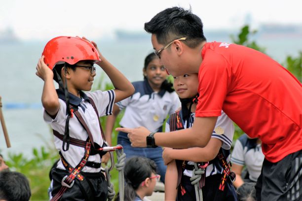 Children gearing up for an outdoor activity