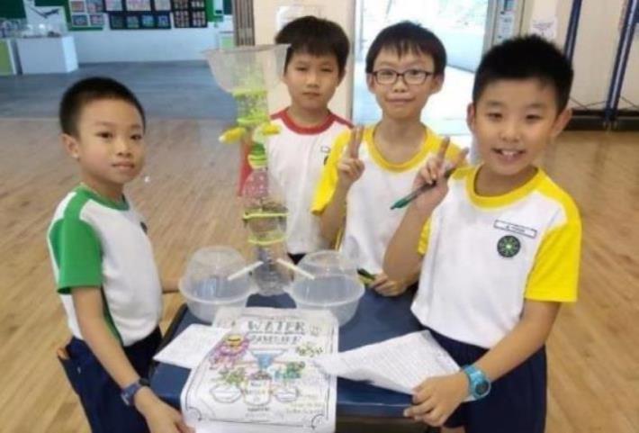 As part of their environmental science ALP, students designed their own rainwater harvester out of recycled materials. Here’s the team proudly showing how their prototype works!