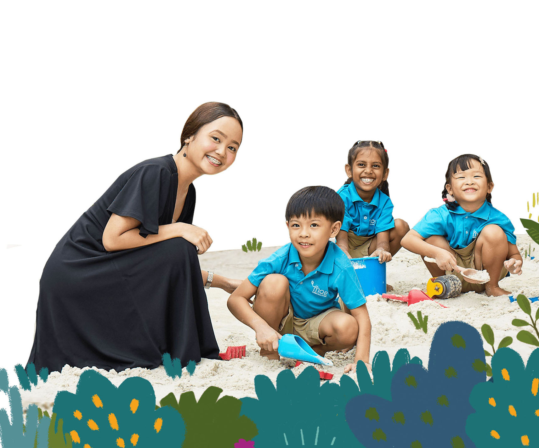 MK children engaged in sand play with teacher